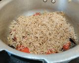 A picture of step 6 of Tomato Rice in Cooker.