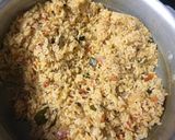 A picture of step 5 of Tomato coconut rice.