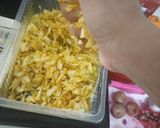 A picture of step 2 of Cabbage poriyal.