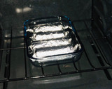 Foto del paso 3 de la receta: Rollitos de pechuga de pollo bañados en salsa bechamel con queso