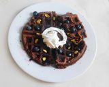 A picture of step 7 of Cranberry Blueberry Waffles with Chocolate Sauce.