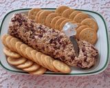 Foto del paso 7 de la receta: Rollo de queso con nuez y arándanos