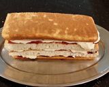 A picture of step 30 of White Chocolate Layered Torte with Rasberry and White Chocolate Cream.