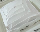 A picture of step 14 of Black forest chocolate sponge cake.