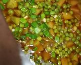 A picture of step 10 of Sohanjna alu matar(Indian horseradish with potato and peas).
