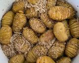 A picture of step 7 of Hasselback truffle roasted potatoes.