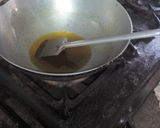 A picture of step 6 of Aloo fulcopi katla rosha ar misti doi.