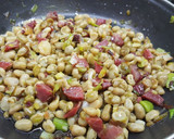 Foto del paso 4 de la receta: Habitas con jamón y ajetes