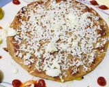 A picture of step 5 of Stuff Pizza paratha.