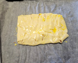 Foto del passaggio 5 della ricetta Sfoglia con zucca,scamorza e speck