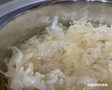 A picture of step 3 of Black Date, Snow Fungus, and Lotus Seed Sweet Soup.