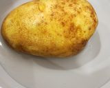 A picture of step 2 of Cheating baked potatoes.