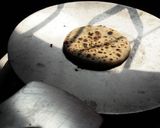 A picture of step 6 of Cheesy kulcha on tawa.
