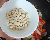 A picture of step 7 of Soya Chunks Capsicum & Onion Curry soyabeena badi ki sabji.