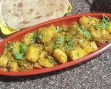 A picture of step 7 of Khatti meethi Aam aloo ki sabji.