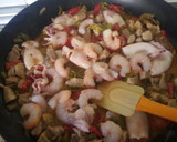 Foto del paso 2 de la receta: Paella de calamaritos y magro