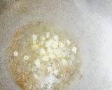 A picture of step 1 of Garlic coriander rice.