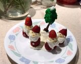 A picture of step 4 of Strawberry Santas 🎅 🌲.