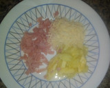 Foto del paso 2 de la receta: Calabacines rellenos de jamón cocido y queso al microondas