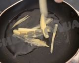 A picture of step 10 of Singaporian Rice.
