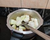 A picture of step 7 of SPICY HING LAUKI with COCONUT...