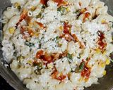 A picture of step 4 of Italian white sauce pasta.