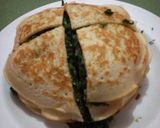 A picture of step 10 of Sukumawiki Stuffed Pancakes.