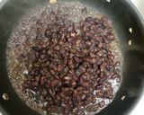 A picture of step 2 of Fried black beans.