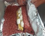 Foto del paso 4 de la receta: Pan de carne con jamón, queso y huevo