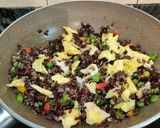 A picture of step 7 of EGG FRIED RICE with BLACK RICE.