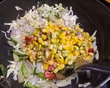 A picture of step 3 of Indian style Mix veg fried rice from leftover rice.