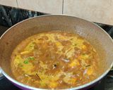 A picture of step 8 of Raw papaya curry.