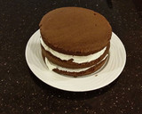 A picture of step 18 of Mocha Layer Cake with Whipped Mascarpone Cream and a Coffee Glaze Drizzle.