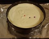 A picture of step 12 of White Chocolate Cherry Truffle Cheesecake.