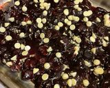 A picture of step 2 of Cherry & White Chocolate Cobbler.