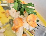 Foto del paso 5 de la receta: Filetes de lubina al horno con su propio pil pil
