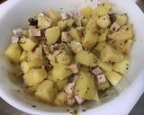 Une image de l'étape 13 de Salade marinée de pommes de terre au porc, oignons nouveaux et tomates orange.