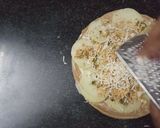 A picture of step 5 of Sandwich pizza from leftover Roti.