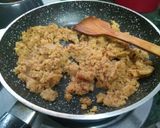 A picture of step 1 of Jaggery Moong halwa.