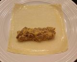 A picture of step 8 of Cheeseburger Egg rolls.
