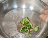 A picture of step 3 of Maharashtrian Lunch Thali of Bhakri, Vangyache Bharit, Phodniche Varan, Gul aani Tup.
