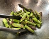 A picture of step 5 of Sheet Pan Roast Balsamic Chicken with Tomatoes, Onions & Asparagus.