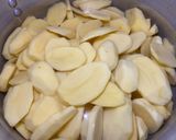 A picture of step 1 of Golden brown potatoes.