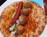 A picture of step 1 of Chicken Ball n sausage Pita roll.