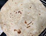 A picture of step 7 of Roti with brinjal aloo fry.
