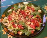 Une image de l'étape 8 de Salade de tomates au comté et noix sur lit de feuille de chêne.