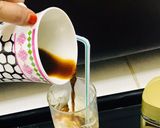 A picture of step 3 of Caramel Affogato coffee Italian dessert.
