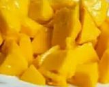 A picture of step 1 of Mango popsicles.