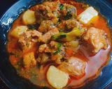 A picture of step 4 of Aloo Gosht with three Spices.