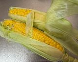 A picture of step 3 of Easy! Corn in the microwave.